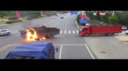 Truck Driver Rescues Motorcyclist after Fiery Crash in East China City