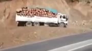 Truck dumps with material