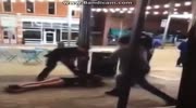 Police smash woman on the concreed.