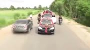 Two Bikers Send Flying During Wedding Procession.