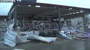 LOOKING FOR VICTIMS IMMEDIATELY AFTER A TORNADO KILLS A CAR DEALERSHIP