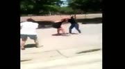 women fight in the street