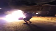 Drunk guy playing with petrol and fire.