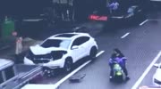 motorcycle is pressed by car