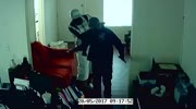 Man is knocked by black robber in his apartment