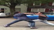 Black bites his enemy while fight