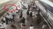 pregnant woman throws to the train tracks