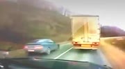 Car crashes with another when trying to overtake truck