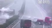 TWO TRUCKS RUN IN OPPOSITE LANES