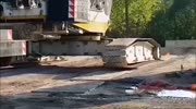 Lucky Crane Operator Avoids Debris