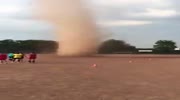 "Dust Devil" during a game of soccer can de fun.