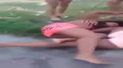 Girl with no pants wins a fight against two