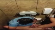 Couple caught having sex in a public bathroom