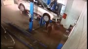 Car falls crushing a worker
