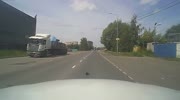 MOTORCYCLIST HITS CAR and goes airborne.