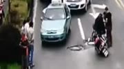 Rider falls under the SUV, gets his head run over and survives due to helmet