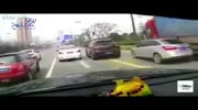 Red Truck spills its load on a car (repost)