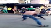 Indian drunk man fighting in street