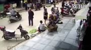 Reversing truck crushes a group of pedestrians