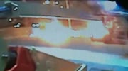 Woman dies when speeding car hits pole, catches fire