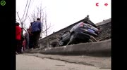Car crashed and lands on the roof.