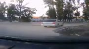 A speeding motorcyclist slams into a turning car