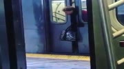 Woman in a red jacket strangled by a trains door