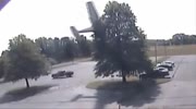 Lucky pilot survives crashing into tree