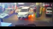 car gets caught in flames at gas station