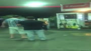 Drunk men fight at the gas station