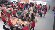 Surveillance video shows chaos as shooting erupts outside Apple store