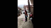 Mad man stabs his wife on the street