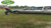 Redneck tries to demolish a car