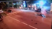Speeding biker plows into a car