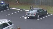 Knocks himself out on car while trying wheelie