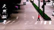 Man in a red shirt gets run over