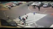Pedestrian traffic sign falls on a motorcyclists