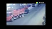 truck passes over a man