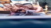 Non violent video shows captured Nigerian thieves