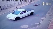 Couple on a scooter avoids death by a pole