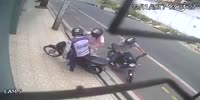 Man passing by a crime scene - robbing a guy off his bike, opens fire killing 2 thugs