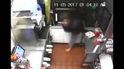 Black woman barely fits the window to steal in McD drive through