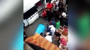 Man attack a woman and gets beaten by crowd