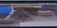 Construction falls on a worker (poor quality footage)