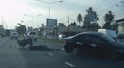 Rider is pushed to the opposite lane by lost control car