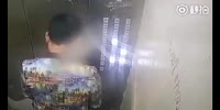 Stupid Chinese pisses in elevator, causing short circuit