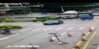 Cyclist falls under a cement truck