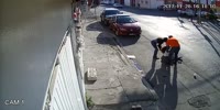 Truck pulling a cable and aiming at a girl on the ground