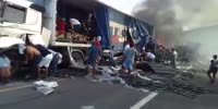 Looting a crashed truck in Brazil