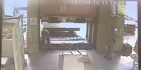 Worker gets crushed by a machine